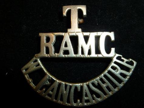 T RAMC W LANCASHIRE white metal Shoulder Title
