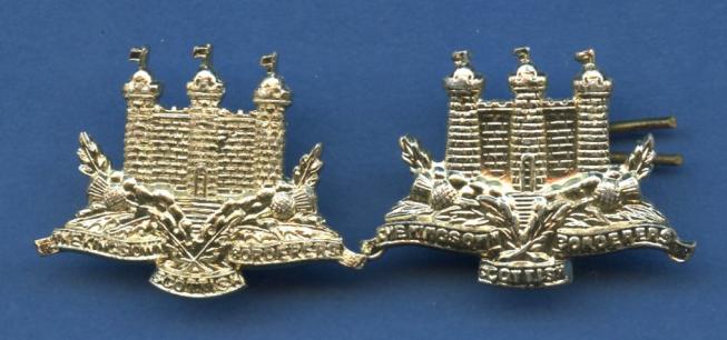 Pair of Kings Own Scottish Borderers Collar Badges