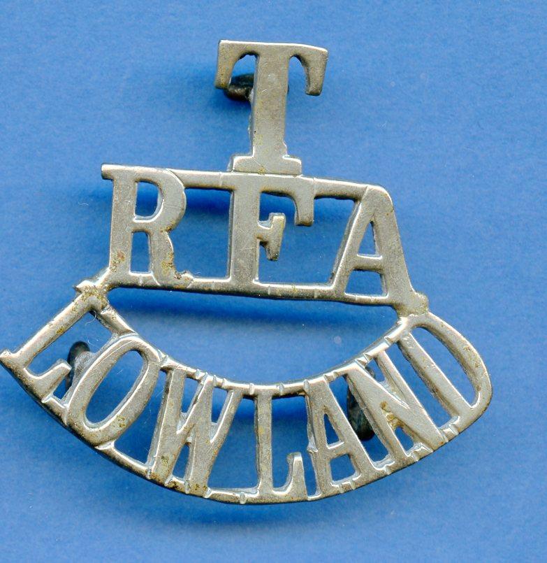 T RFA Lowland Royal Field Artillery  White Metal Shoulder Title Badge