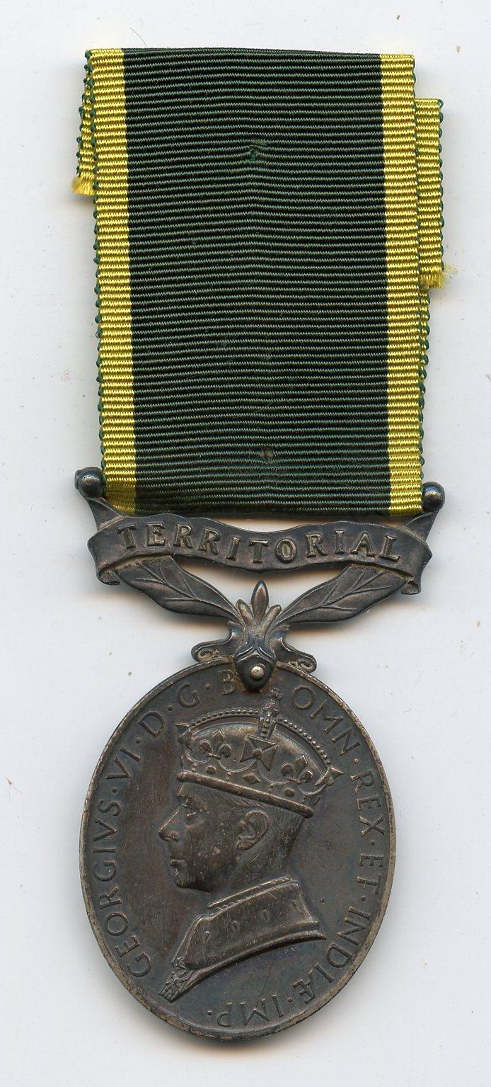 Territorial Efficiency Medal : To Pte E. E. Whittaker, Royal Military Police